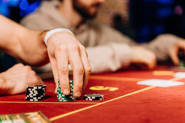 Blackjack table interface showing dealer hand and player options